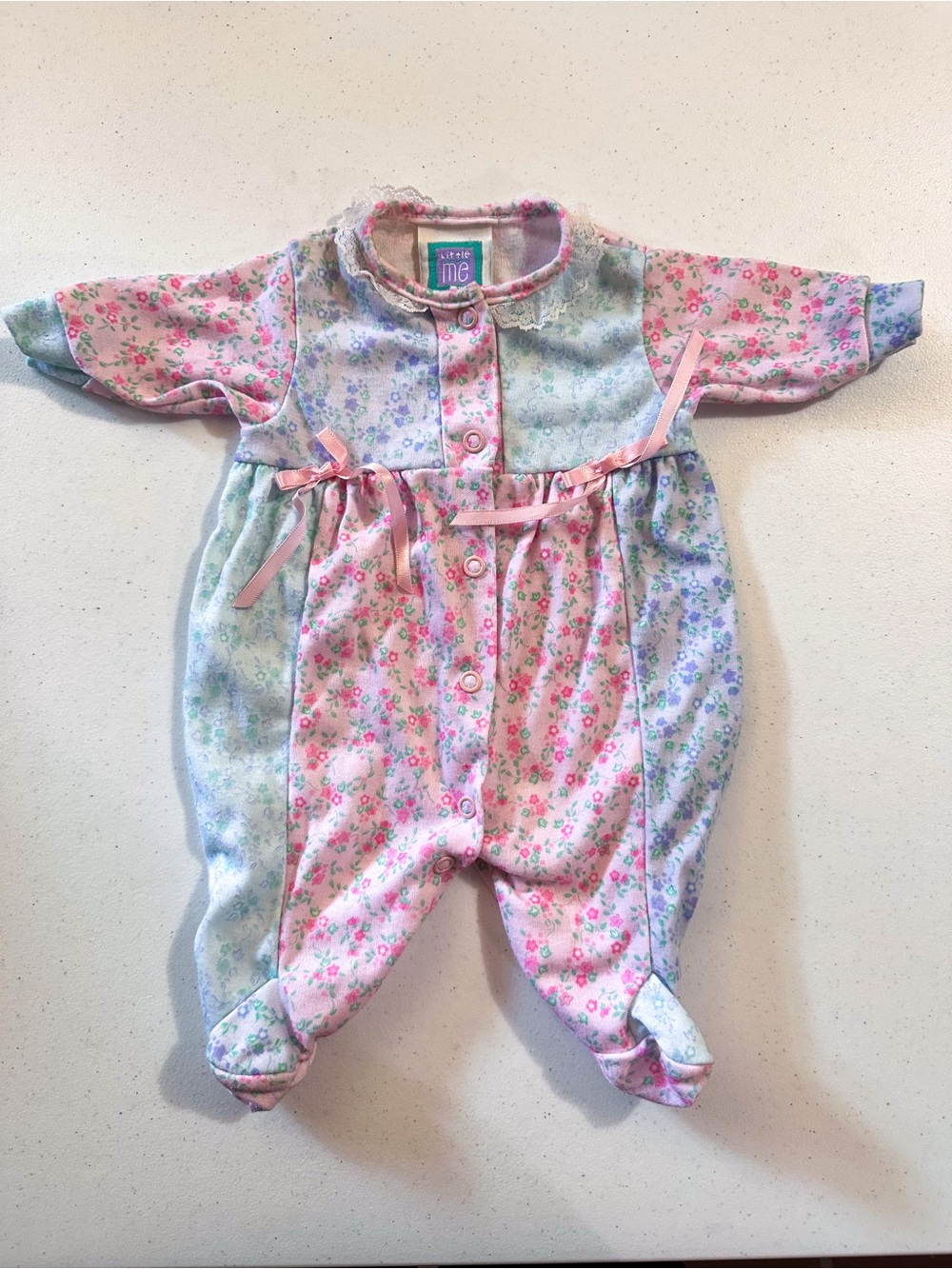 Little Me Vintage Floral Footed One-Piece in Pastel Pink and Blue
